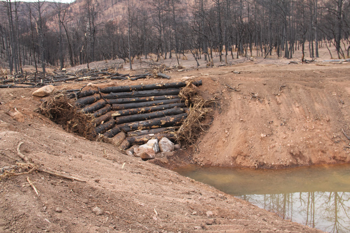 Constructed debris basin in enlarged gully on North Douglas Creek to reconnect fan and fill gully