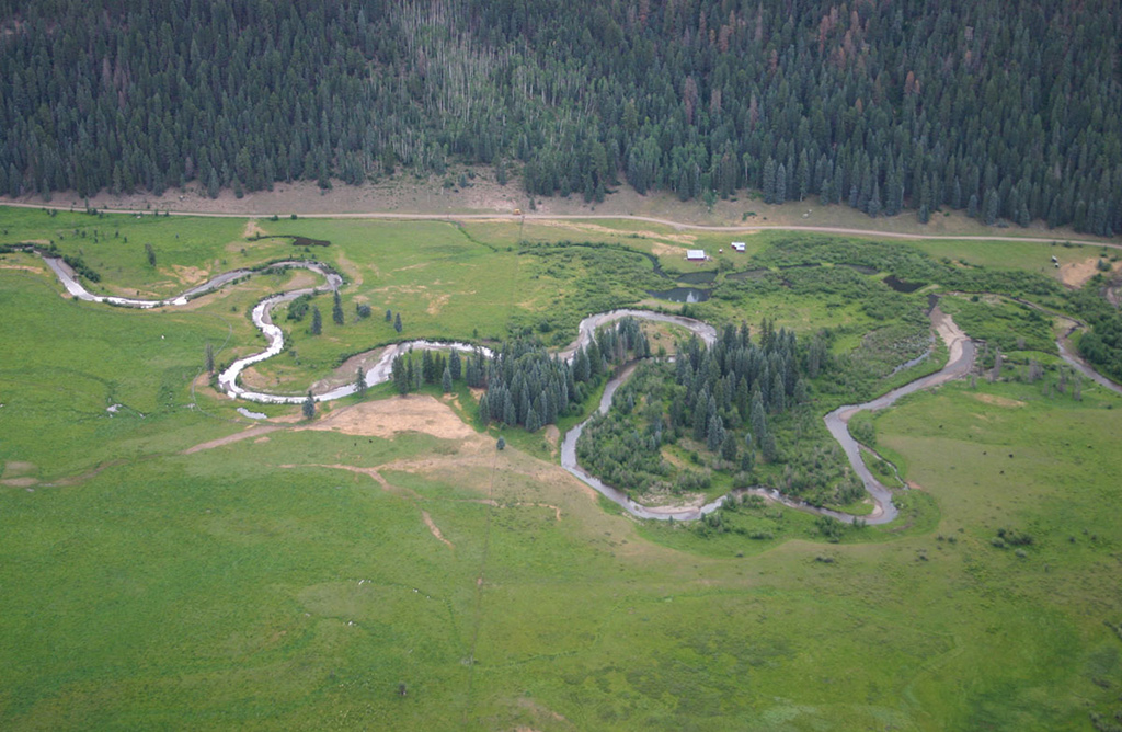 Weminuche Creek after restoration that reconnected the 2,100 ft of abandoned channel and reconnected the channel to its floodplain by plugging the gully at the point of avulsion and creating a series of oxbow ponds within the previous gully
